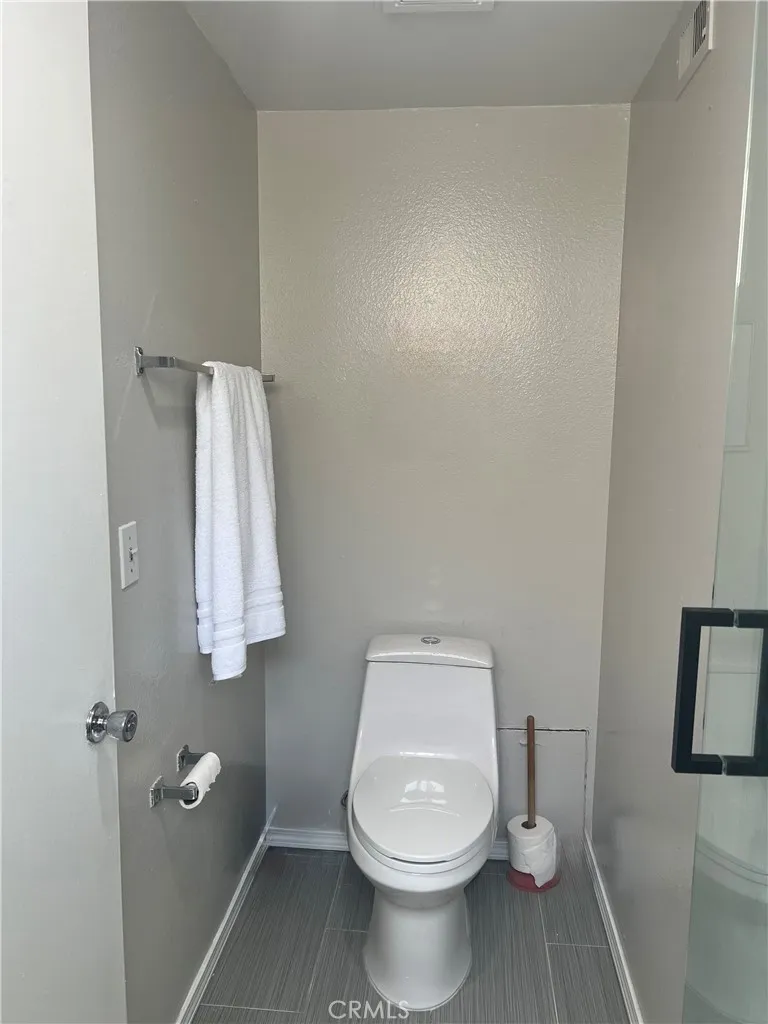 Primary private toilet w/ shower