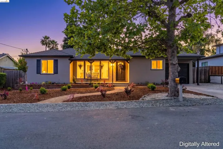 Contemporary ranch-style facade with a covered porch entry