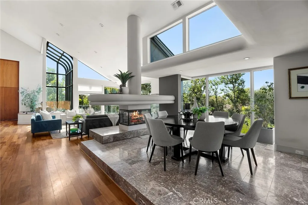 Formal Dining Room and Fireplace Shared with Living Room