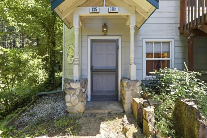 This was the original front door, currently inaccessible from Oak. Leads to downstairs of house.