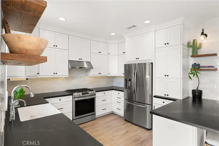 Stainless steel appliances, reverse osmosis filtration system, and a separate Kohler drinking water spout
