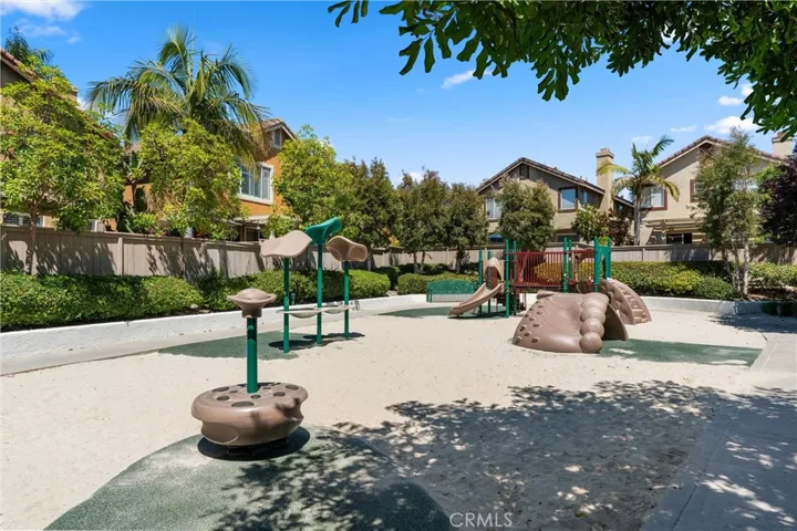 Enjoy access to the community tot lot and play area