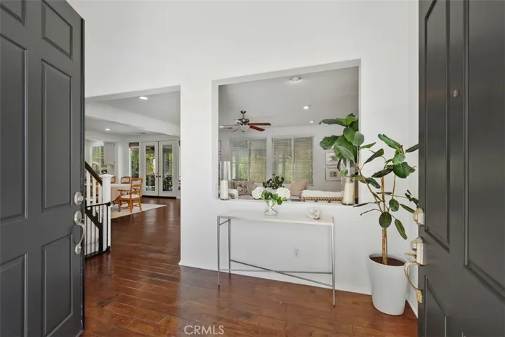Large entry with high ceilings and windows