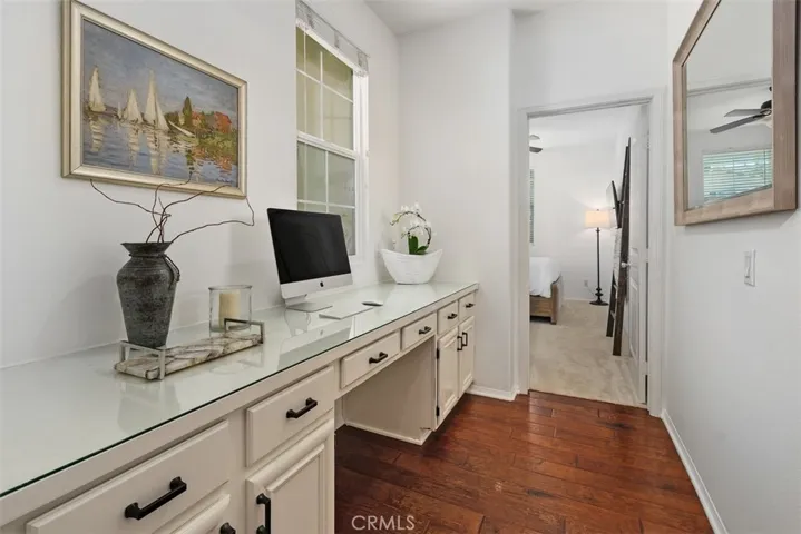 Built-in desk and cabinets by entry and main floor bedroom