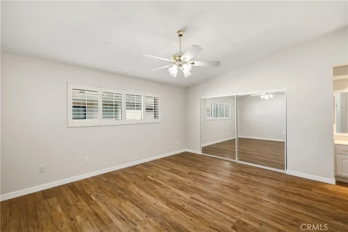 Bedroom #1 with vaulted ceilings and ceiling fan