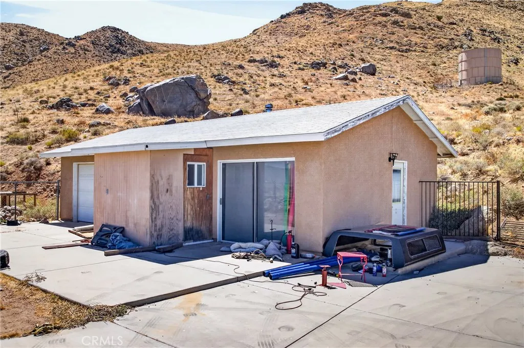 Detached two car garage with workshop and bathroom.