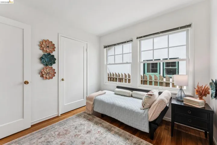 Hardwood flooring complements white walls and trim