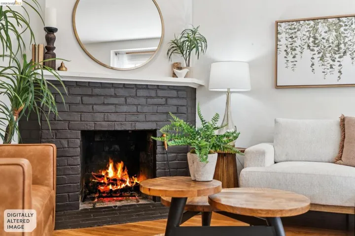Brick fireplace with a painted finish and a white mantel
