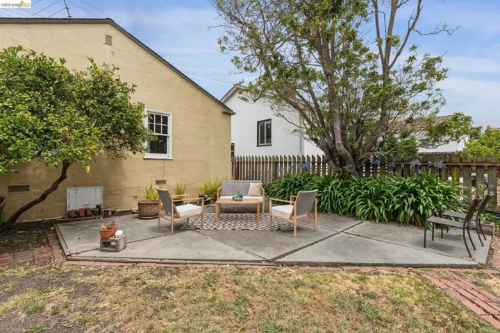 Concrete patio with brick edging