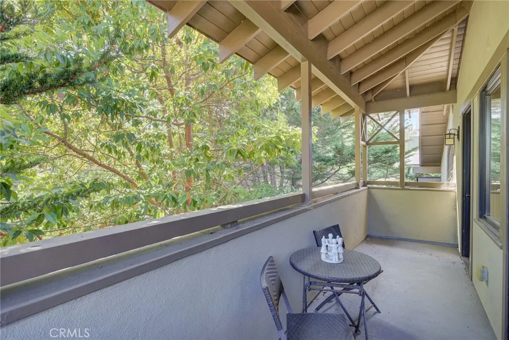 Balcony located at end of hallway and off of bedroom one