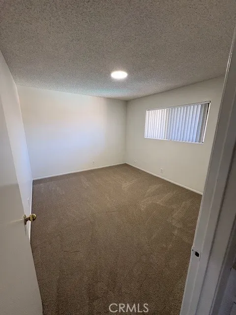 This bedroom has a large walk-in closet