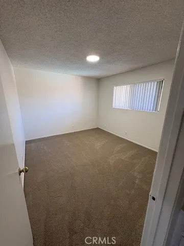 This bedroom has a large walk-in closet