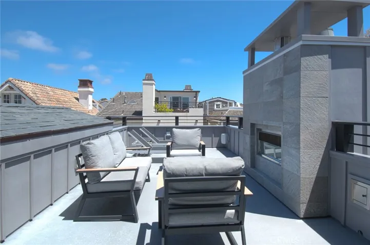 rooftop deck with fireplace