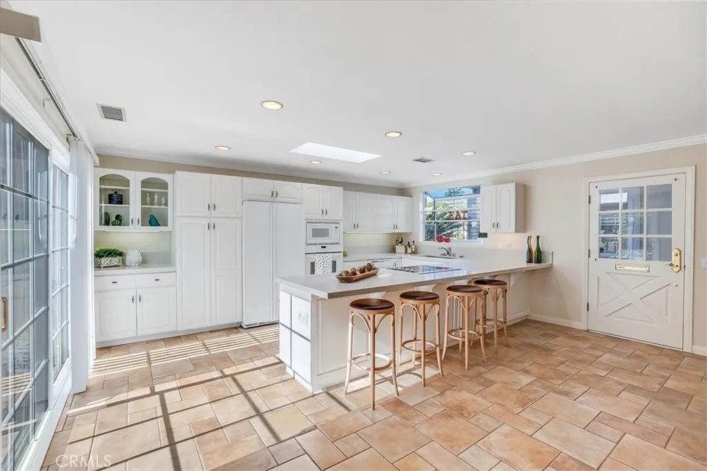 Upgraded tile and carpet in excellent condition.