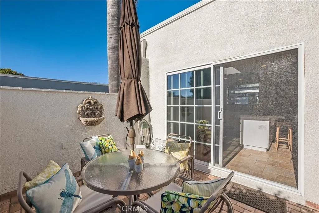View from your patio to the kitchen - patio has 2 slider entryways from both kitchen and dining room