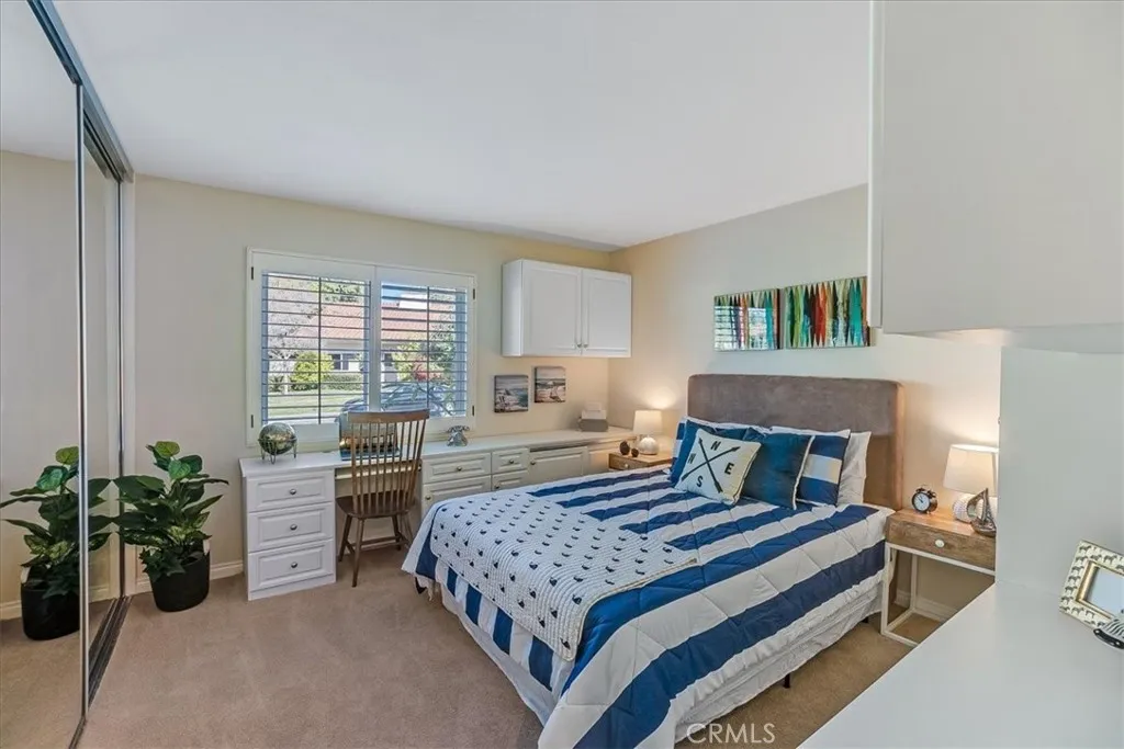 Second bedroom can couple as a home office with built ins and additional storage.