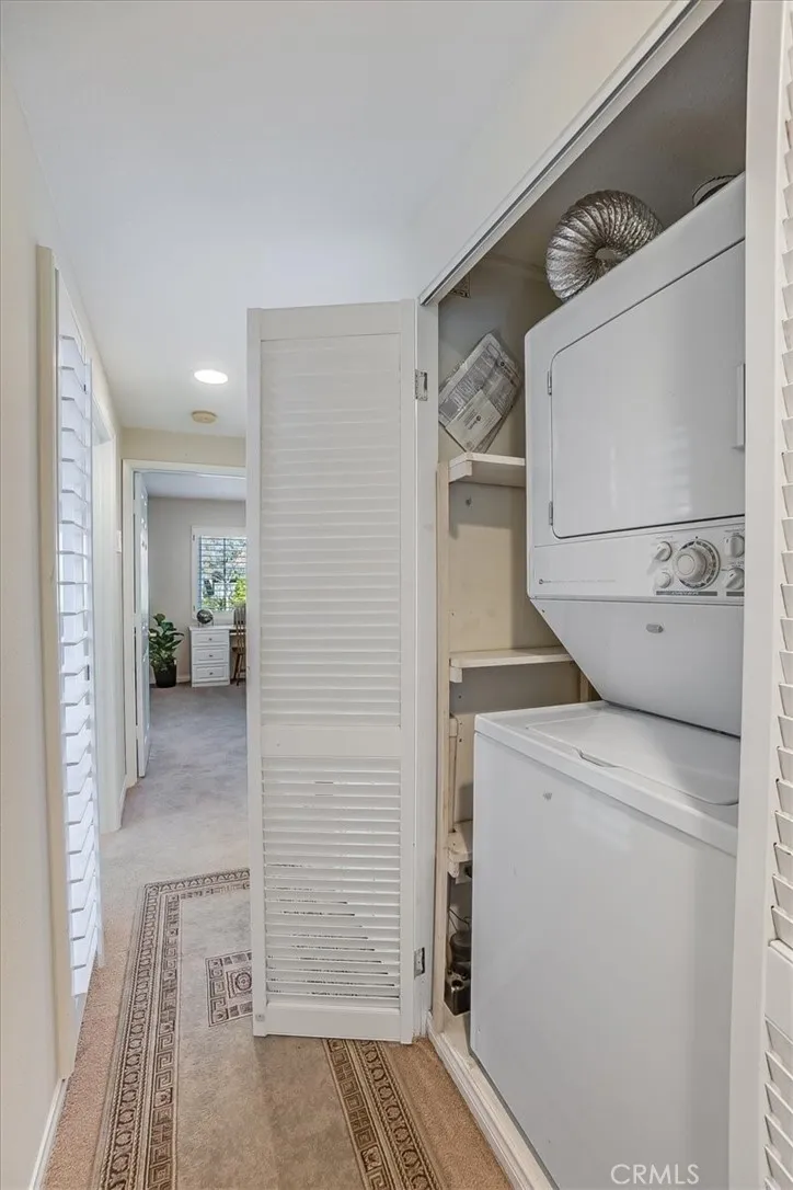 Inside laundry closet with washer / dryer included in lease term