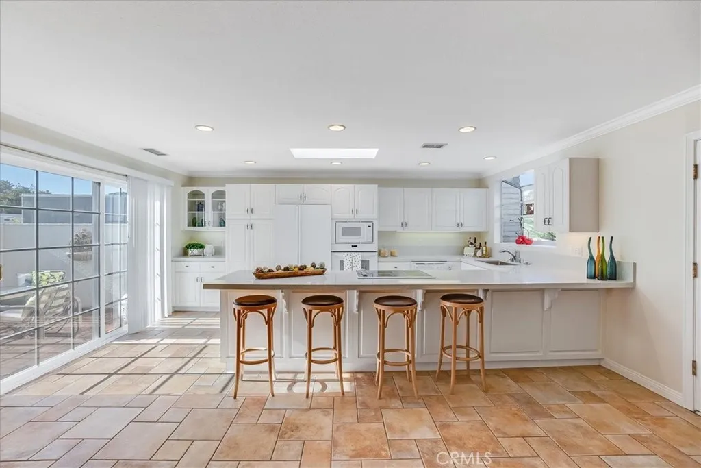 Kitchen opens to living room to create great flow within the home.