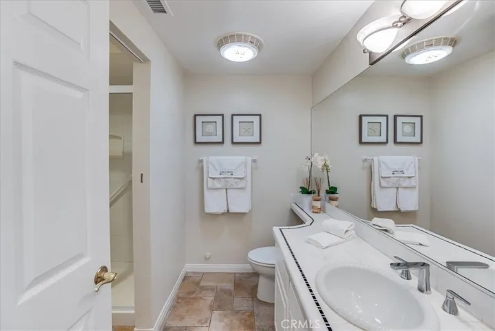 Upgraded bathroom floors and fixtures.