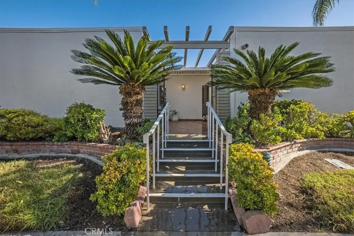 Welcome to 2002 Via Mariposa D, an upgraded villa in Laguna Woods with only 5 exterior steps to access. No stairs inside.