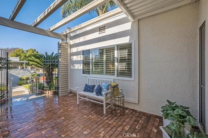 Generous courtyard space with shade and covered entry