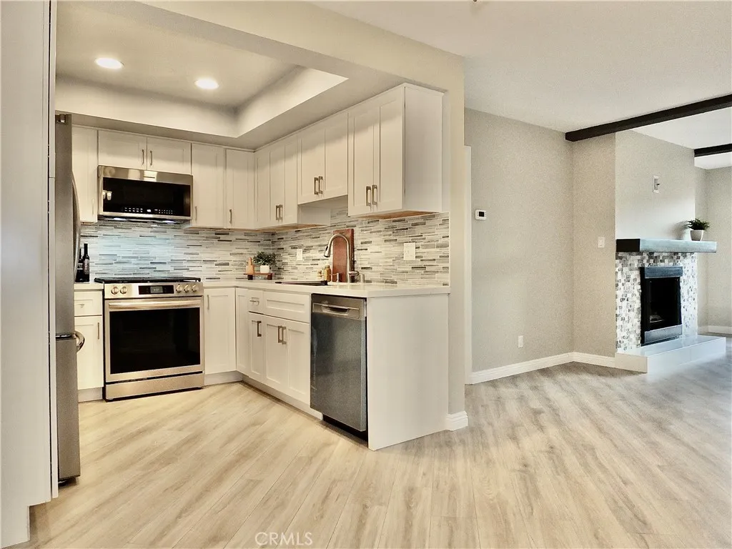 Kitchen open to dining area and living room