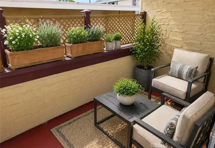Balcony has been virtually staged with furniture