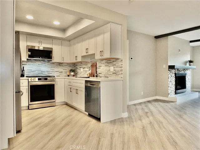 Kitchen open to dining area and living room