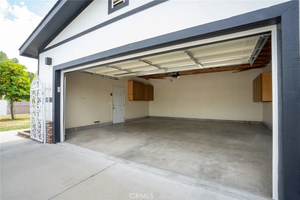 2-car garage with entry from gated courtyard