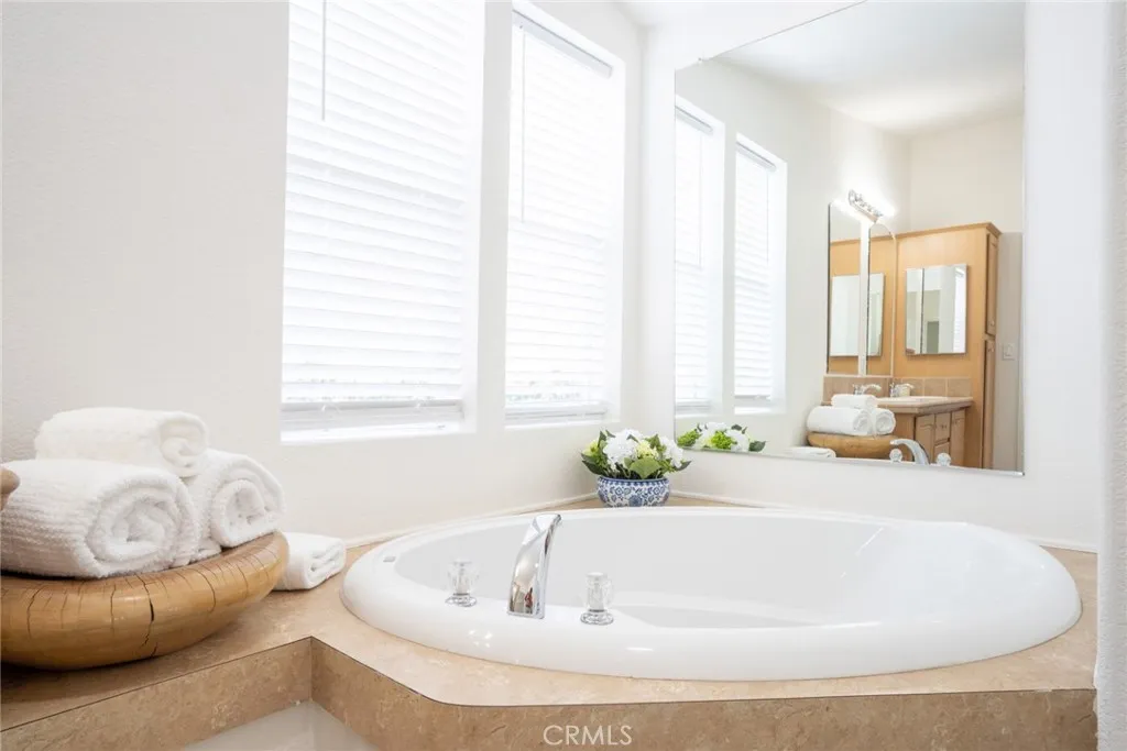 Primary Bathroom with soaking tub + walk-in shower