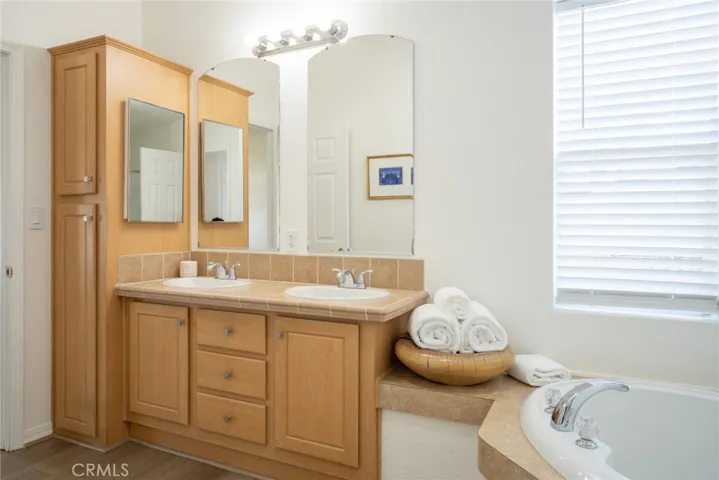 Primary Bathroom with soaking tub + walk-in shower