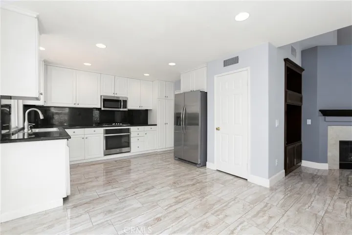 Kitchen and part of the living rom. Kitchen has a pantry