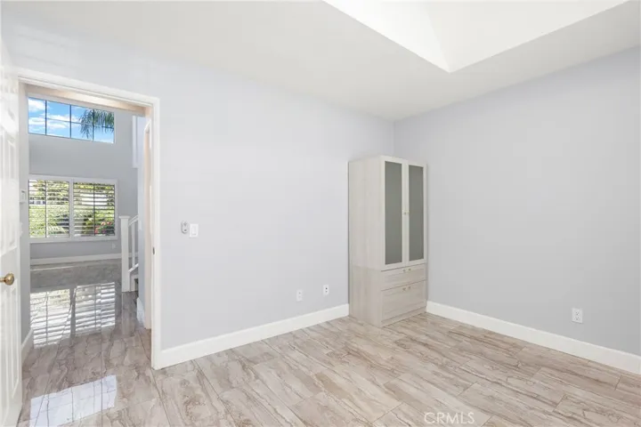 Main Floor Bedroom Digitally staged as office