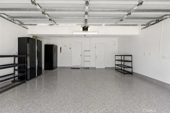 Garage with epoxy flooring and EV charger