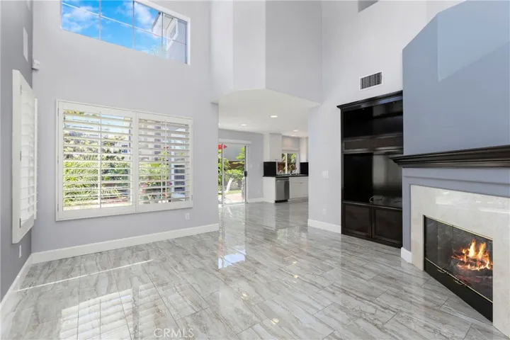 Living Room and Part of Kitchen. Look at this high ceilings