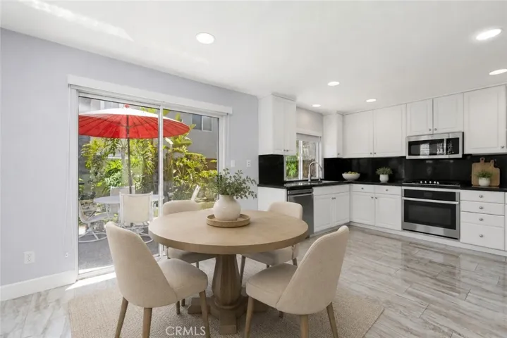 Dining Area and Kitchen digitally staged