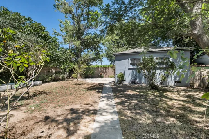 Garage  and raised garden area