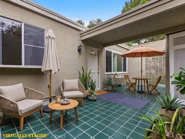 Virtually Staged Pic of one of the many options you can utilize this patio for.