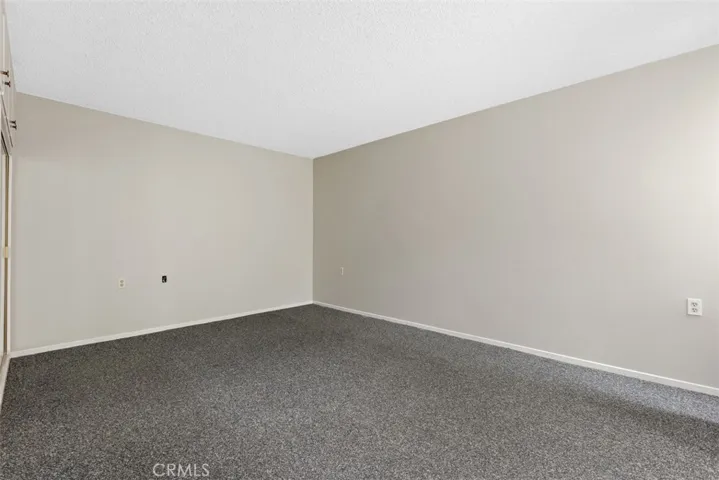 The primary room just off the den/entertainment room has plenty of room to ensure comfort, and a tranquil nights sleep.