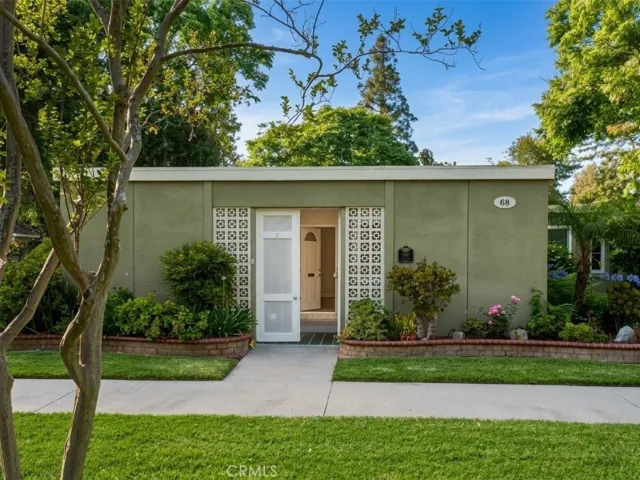 Very few homes can boast about having this welcoming location. Facing an amazing park like setting, surrounded by mature trees, and chirping birds. This peaceful location is one that many have desired, but hasn't been available in over 30 years.