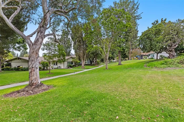 Sweeping park-like greenbelts and towering mature trees showcase the picturesque surroundings that make this location so special.
