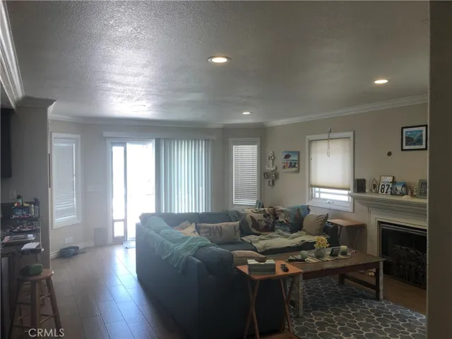 Family room with fireplace and slider to backyard