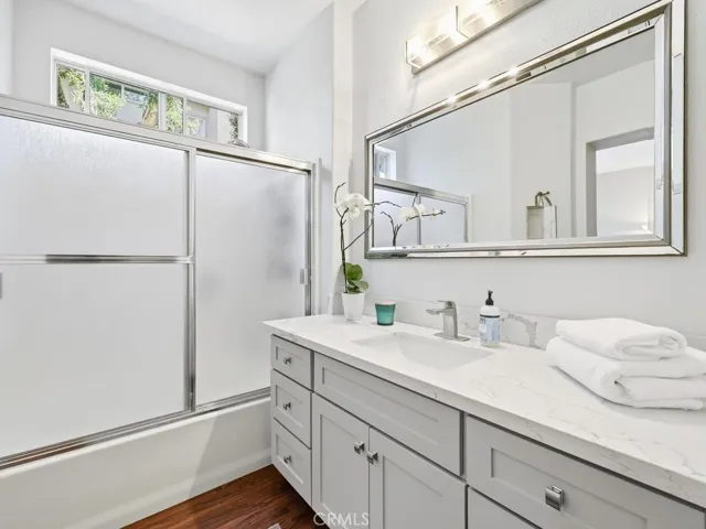 Bathroom is jack and jill style to allow for guest bath entrance from the hallwawy