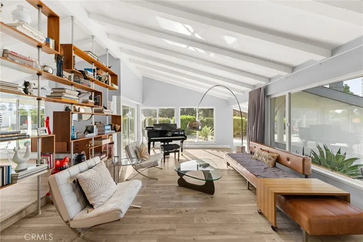 Living Room with Vaulted Open Beam Ceilings