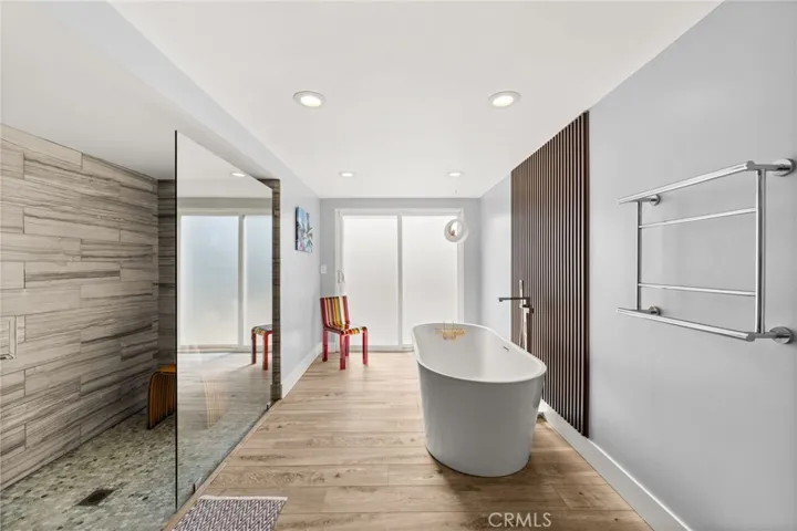 Primary Suite Bathroom with a Separate Soaking Tub