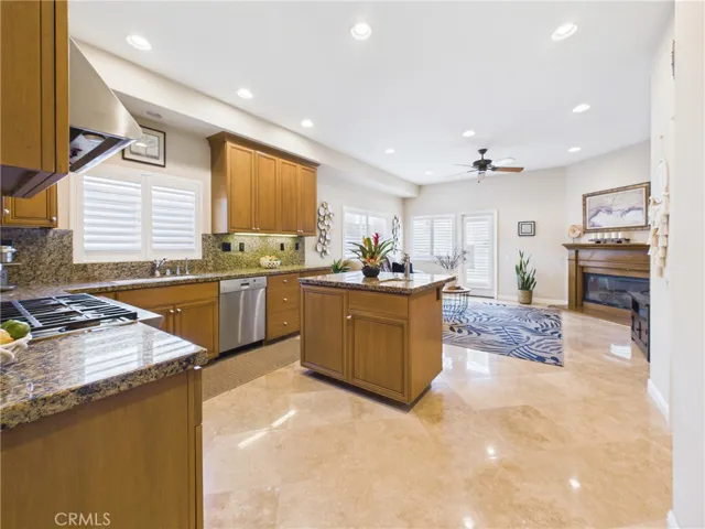 Roomy kitchen opens to the cozy family room