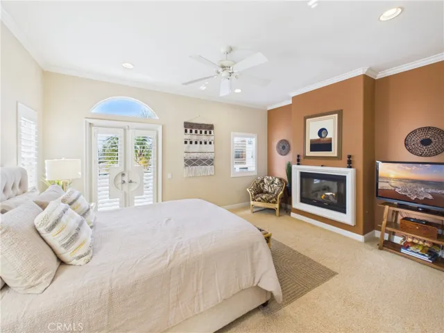 Primary suite w its own balcony and fireplace