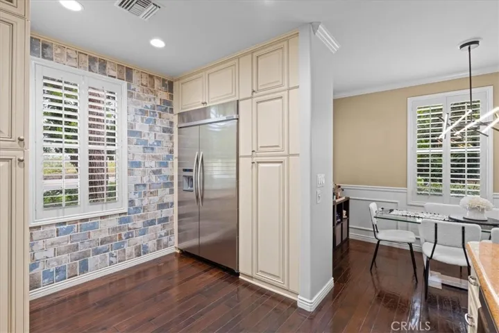 Custom brick wall and built in refrigerator