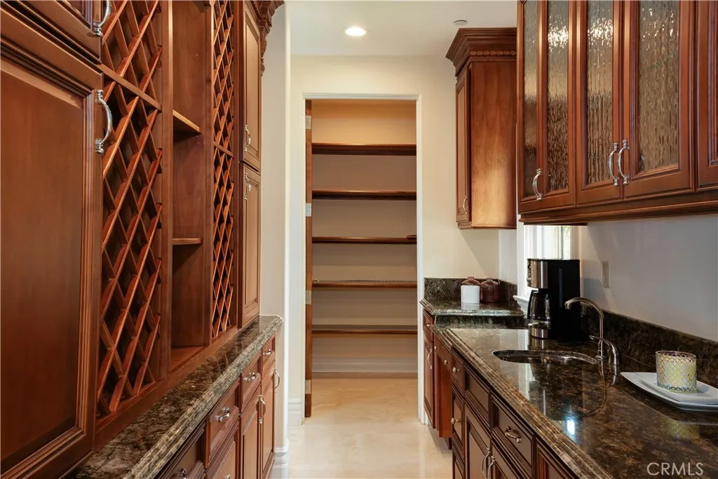 Butler's pantry connecting kitchen and dining room.