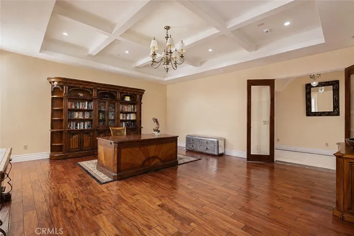 Formal office with coffered ceiling.